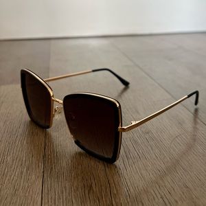 Black and gold sunglasses